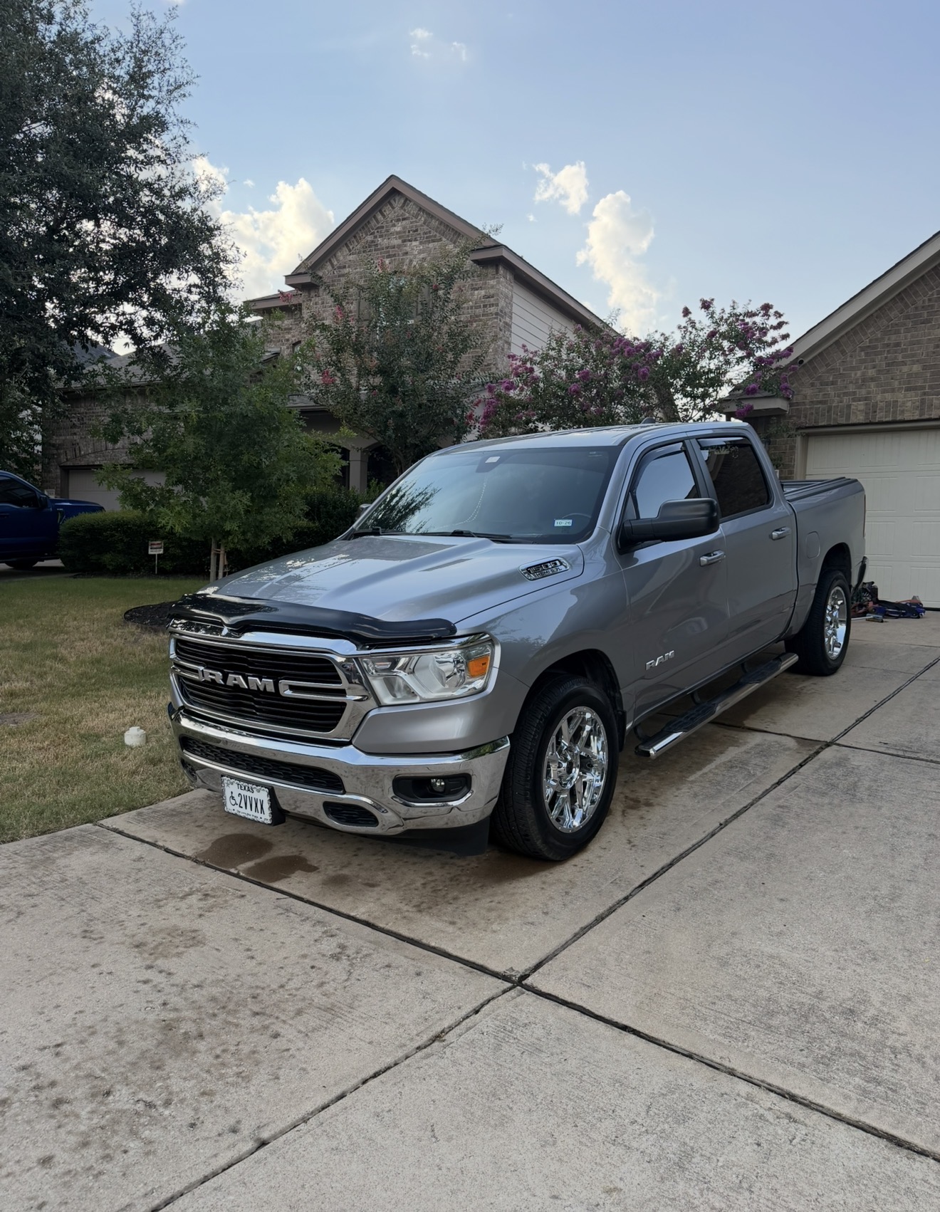 Silver Ram 1500 truck freshly detailed in a driveway